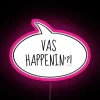Neon sign reading 'What's happening?' in pink letters on a city street at night.