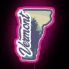 Vibrant neon sign in Vermont with pink hue under dimmed lights.
