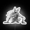 Neon sign reading 'Vicar Amelia' in white letters on a dark background.