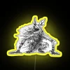 Neon sign reading "Vicar Amelia" in yellow with RGB and neon effects.