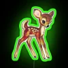 Neon deer sign in vibrant green and purple hues, evoking a retro, neon-lit atmosphere.