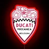 Vintage Ducati racing neon sign with bright red glow.