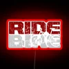 Neon-lit mountain bike with vintage ride RGB colors on a red background