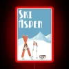 Vintage neon ski resort poster with colorful Aspen landscape at sunset