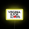 Neon sign reading "Virginia is for Lovers" in bright, colorful letters against a dark background, symbolizing the state's...