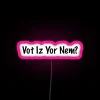 Neon sign with colorful letters spelling out a phrase in a bold, futuristic style.