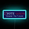 Neon sign reading 'Vote Harold Saxon' in bright blue LED lights.
