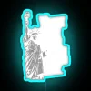 Liberty statue illuminated in neon, with a bold sign urging voters to protect their rights.