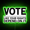 Vibrant neon sign reading 'Vote Like Your Rights Depend On It' in green.