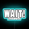 Brightly lit neon sign reading 'Wait, there's a bird!' with enthusiastic birdwatcher theme in blue hues.
