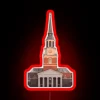 Wake Forest University's Wait Chapel neon sign at dusk, with vibrant red accents against a darkening blue sky