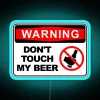 Warning neon sign indicating that someone's beer is not to be touched.