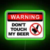 Warning sign with neon green letters reading 'Dont Touch My Beer'