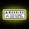 Bright neon warning sign with yellow background