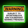 Warning sign with neon green letters, indicating unpredictable sewing enthusiasm.