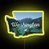 Neon sign in Washington with yellow glow on a dark background