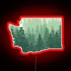 Neon sign in Washington state's vibrant RGB colors at dusk.