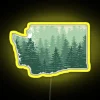 Neon sign with Washington state's outline in yellow, set against a dark blue background.