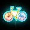 Rainbow bicycle under a neon sign against a blue watercolor background.