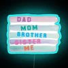 Neon sign with colorful letters spelling out 'We Are A Family'