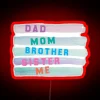We are a family in neon lights, colorful RGB sign with red letters
