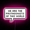 Neon sign with RGB colors reading 'We are the protagonists of this world'