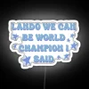 Neon sign reading 'We Can Be World Champion' in bold, colorful letters.