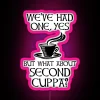 Neon sign with pink text reading "Second Cuppa" above a cup of coffee