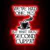 A "Second Cuppa" neon sign with the words highlighted in red.
