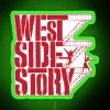 Neon sign with 'West Side Story' written in bold, colorful letters against a dark background.
