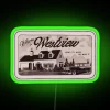 Neon vintage sign in green and red hues, reading 'Westview' with a retro aesthetic.