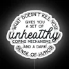 Neon sign displaying the phrase 'What Doesn't Kill You Disappoints Me'