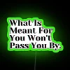 Neon sign with motivational quote about destiny and personal growth.
