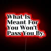 Neon sign with colorful letters spelling out a motivational phrase, reflecting on life's opportunities.