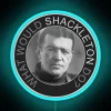 Neon sign with bold, colorful letters reading 'What Would Shackleton Do?'
