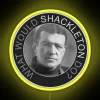 Neon sign with a bold, yellow font displaying 'What Would Shackleton Do?'