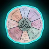 Wheel of the Year neon sign with blue hues, symbolizing pagan or witchcraft themes.