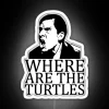 Neon sign with Michael Scott's question 'Where are the turtles?' in bold, white letters on a dark background.