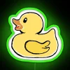 Whimsical yellow rubber ducky in a neon sign setting amidst lush greenery.