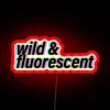 Neon sign with vibrant red, green, blue, and yellow colors on a dark background.