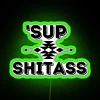 Neon sign featuring Willie Jack's Sup Rez Dogs logo in green.