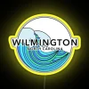 Neon sign with colorful wave design and yellow accents