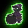 Cat sitting in front of a neon sign with a witch's theme, surrounded by colorful RGB lighting.