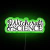 Neon sign with intertwined occult symbols and scientific elements.