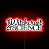 Neon sign with a mystical blend of witchcraft and science concepts in bold, colorful letters.
