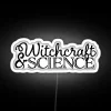 Neon sign featuring intertwined symbols of witchcraft and science in bold, RGB colors.