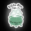 Neon coffee shop sign reading 'Witches Brew Coffee Co.'