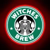 A vibrant, colorful neon sign reading 'Witches Brew' in bold, rainbow hues.