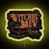 Neon sign featuring a vibrant, colorful concoction with swirling liquid and steaming potion ingredients