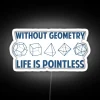 Neon sign with colorful geometric design emphasizing the importance of geometry in life.